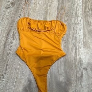 Orange bodysuit